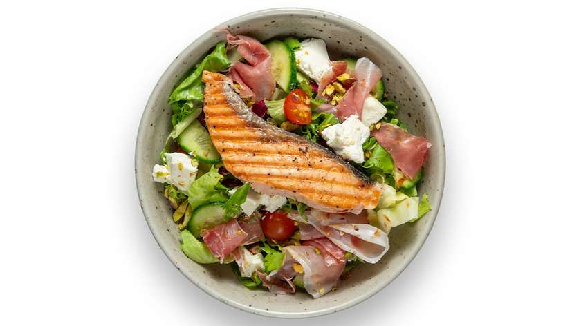 Salad with feta cheese, Serrano ham and salmon