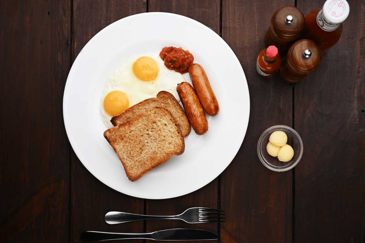 Two eggs with sausage