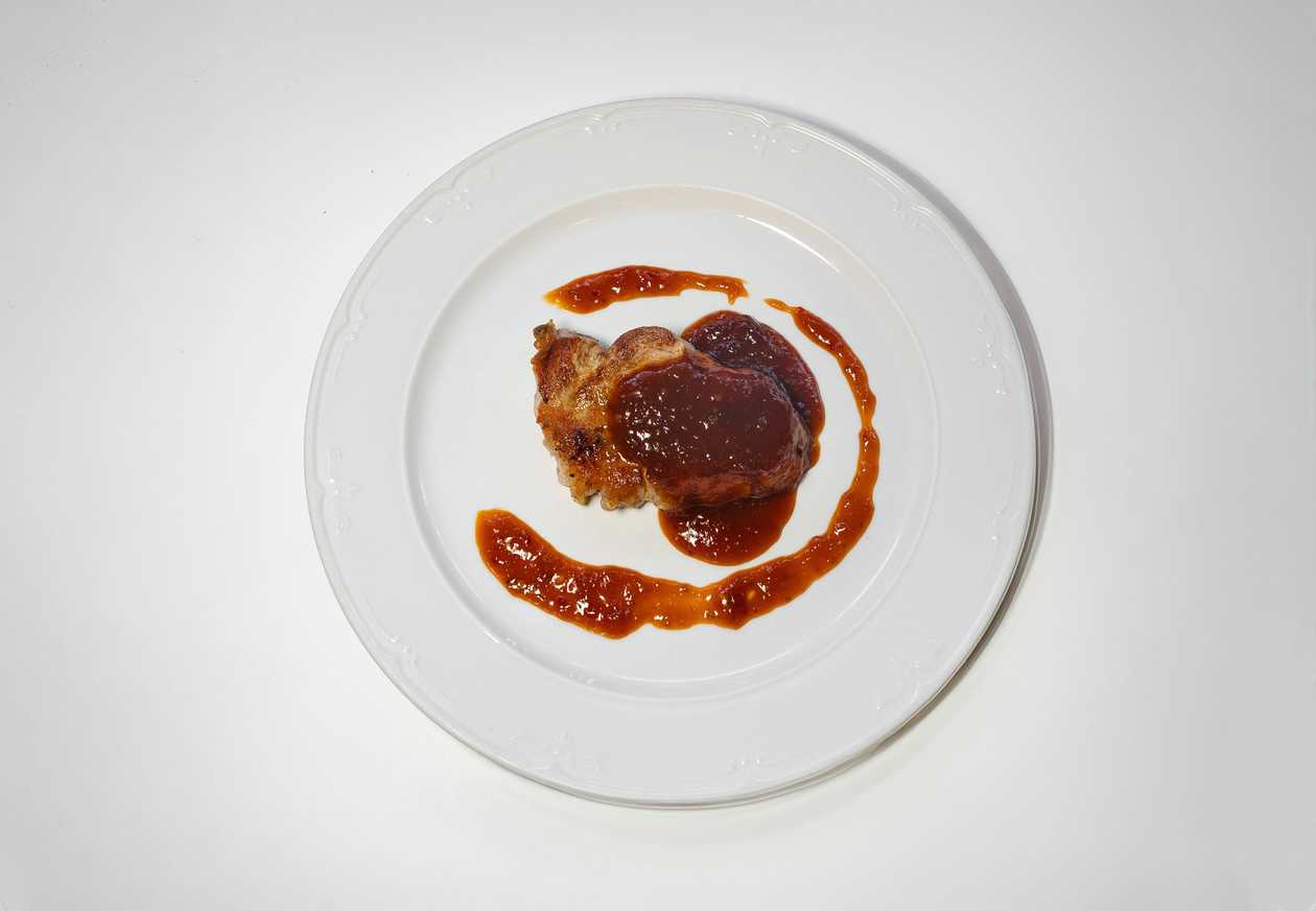 Pork neck steak with honey-spicy marinade