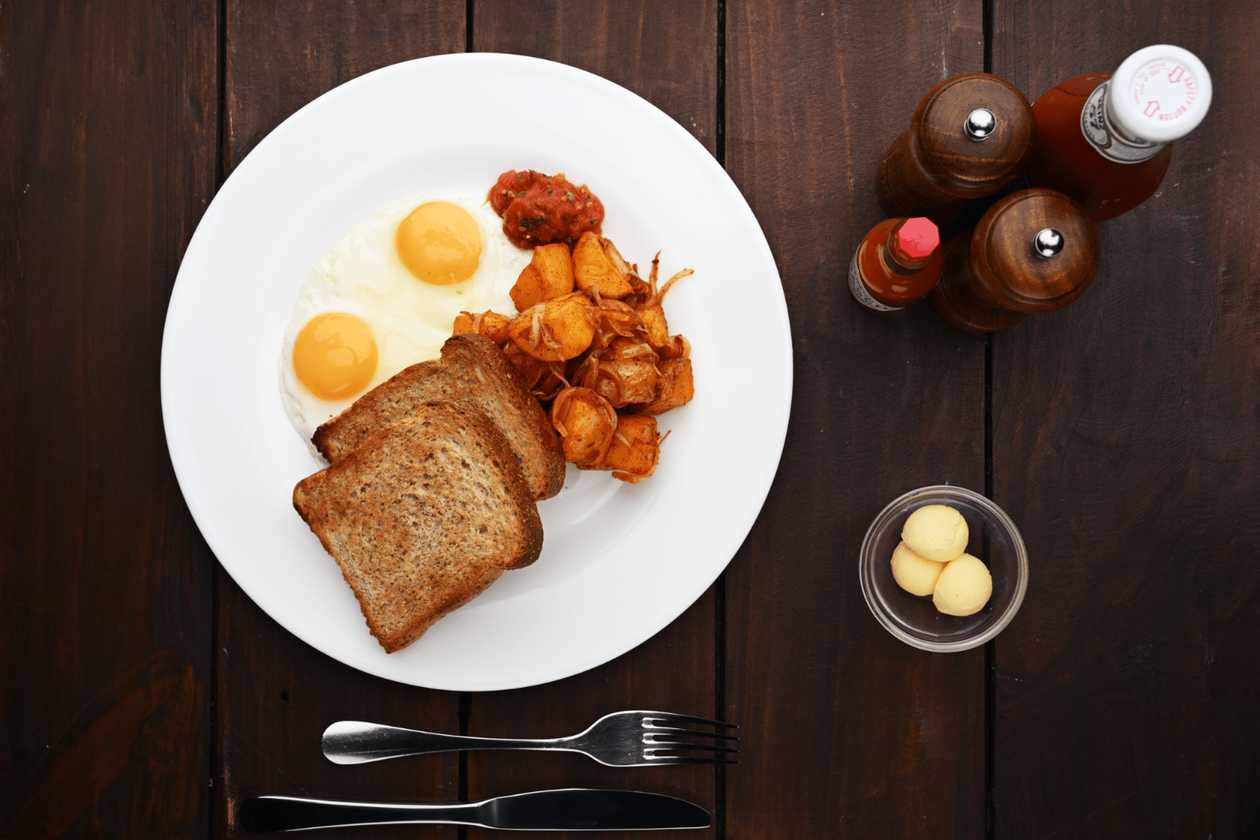 Two Eggs with chips/homefries