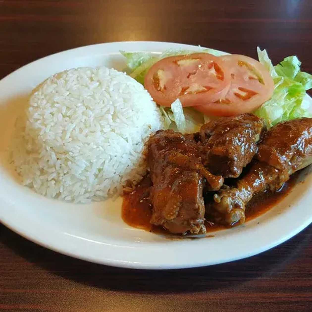 Plain rice with gravy stew (cow meat ad boiled egg)