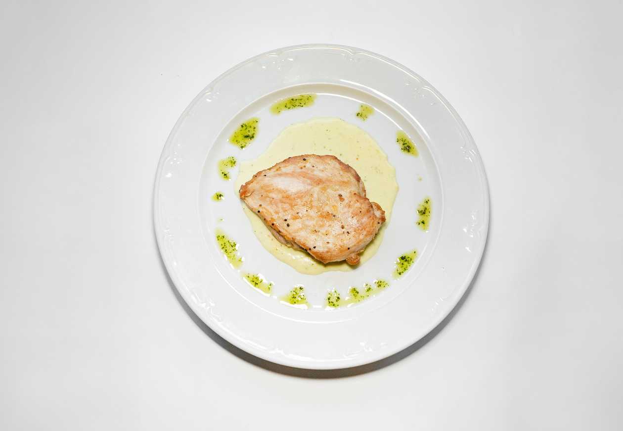 Chicken breast steak with herb-cream sauce