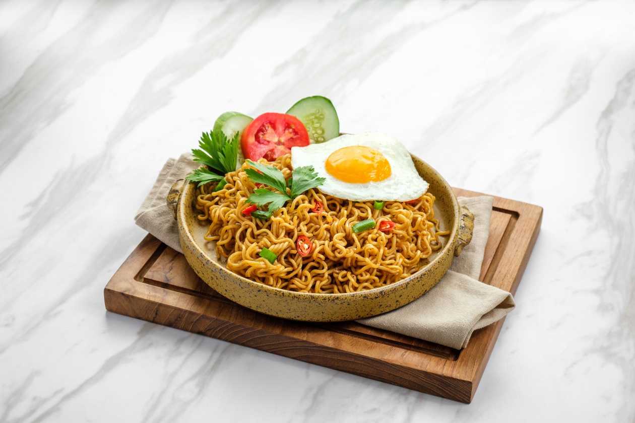 Indomie with Gizzard, Sausage Egg, Sardine Canned Beef with Veggies