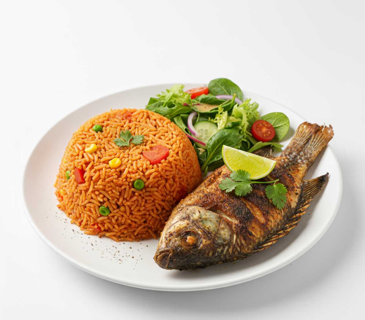 Jollof rice served with grilled tilapia and salad