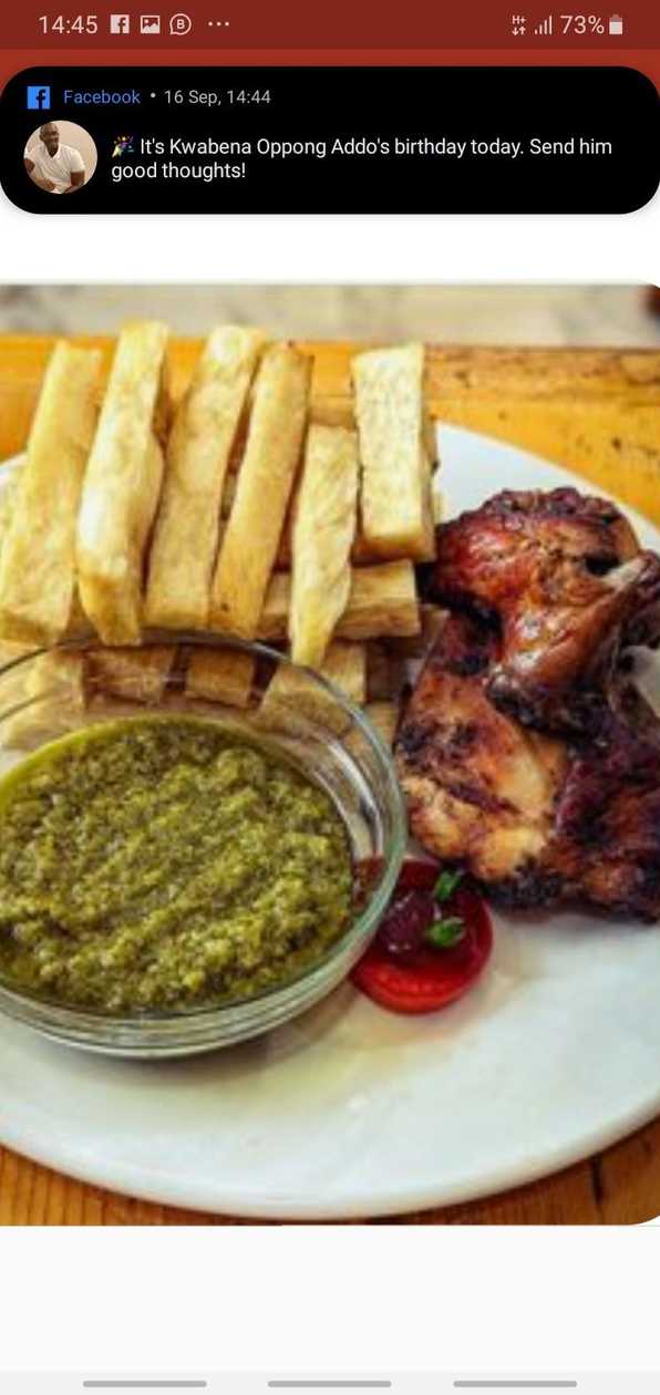Fried yam with fried gizzard, fried eggs and sausage