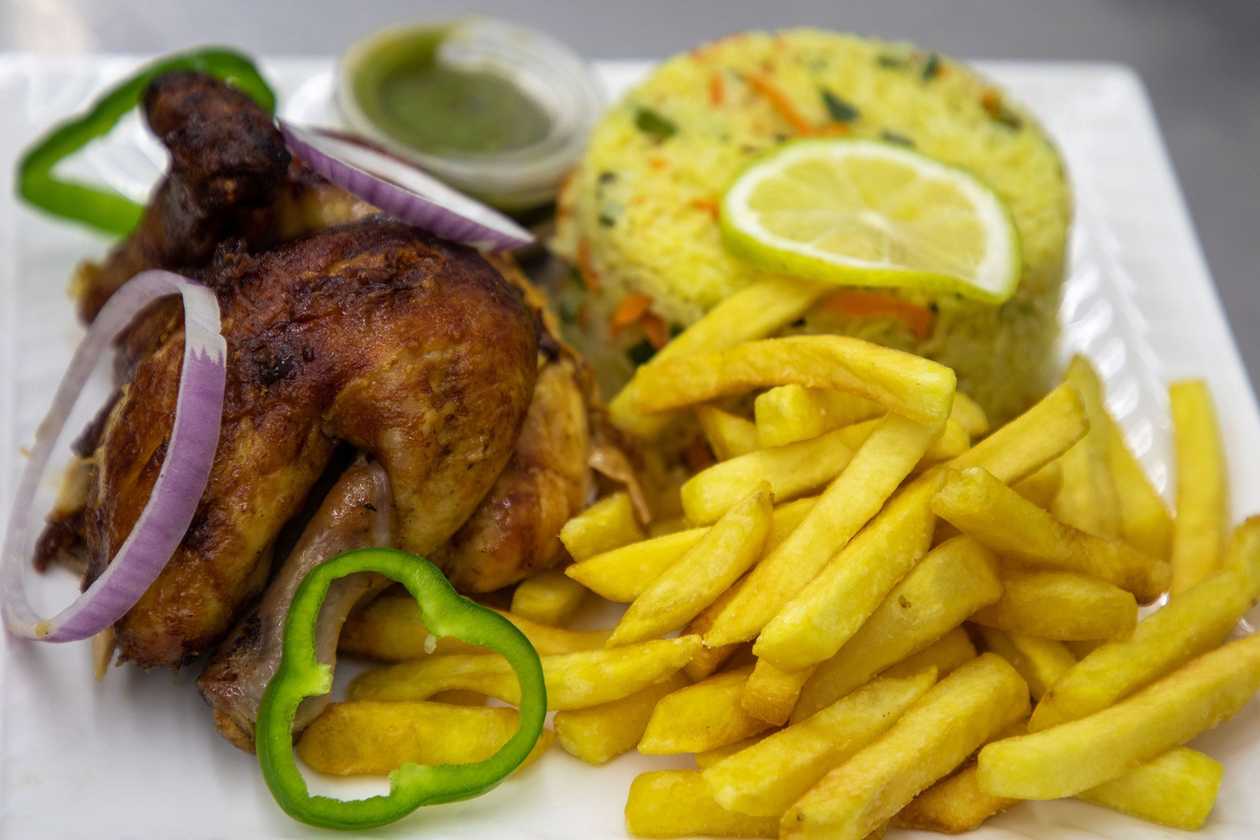 Half Chicken with Fried Rice / Chips & Saute Veg.