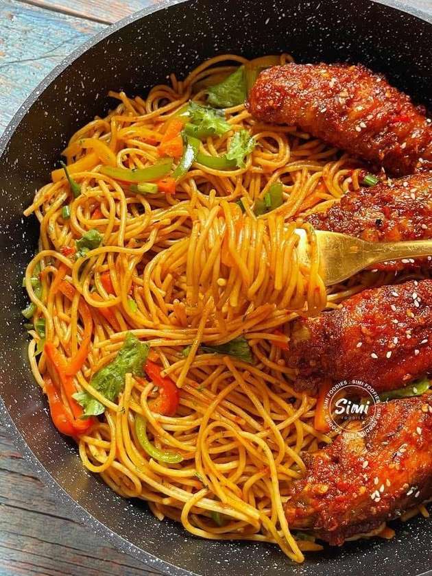 Spaghetti with egg, sausage, sardines, corned beef, vegetables and extra 2eggs
