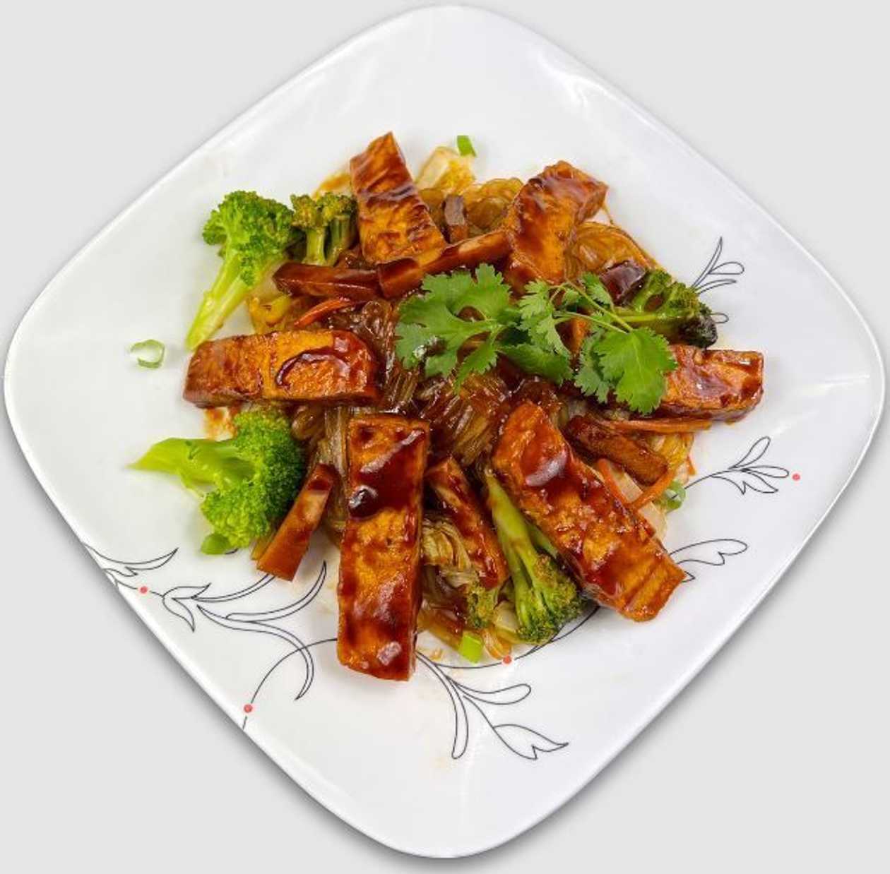Fried wide noodles with tofu
