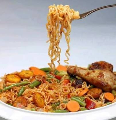 Indomie with egg, sausage, sardines, corned beef, vegetables and extra 1 egg