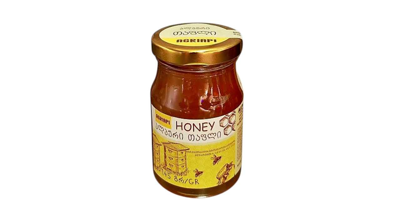 Alpine honey in a 145 gram jar