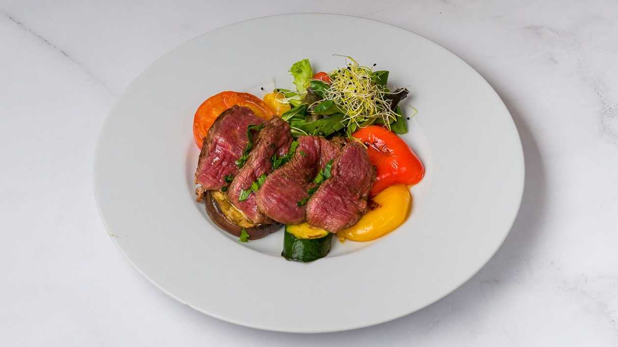 Beef Tagliata with Cherry Tomatoes and Arugula Salad, Grilled Vegetables