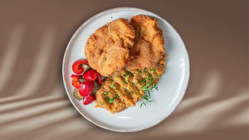 Cotlet de porc pane cu cartofi răntăliți