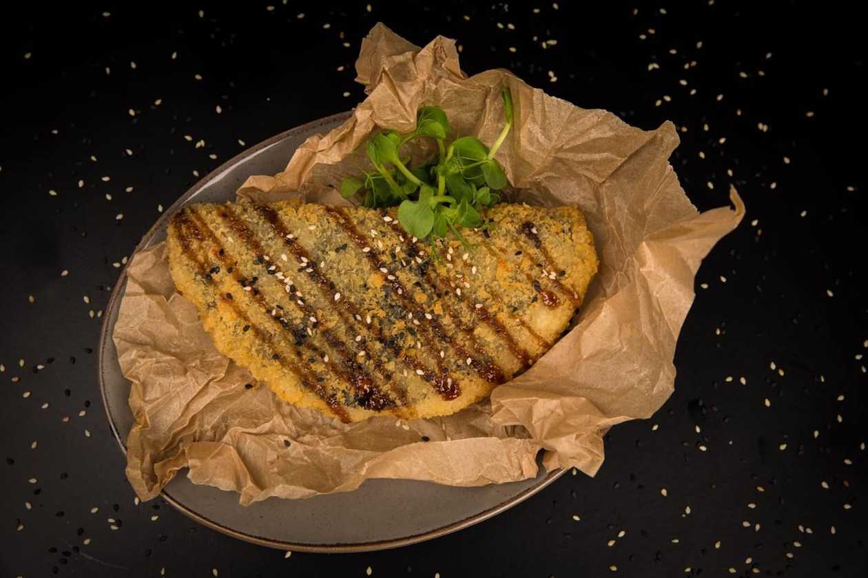 Sushi cheburek with fried salmon