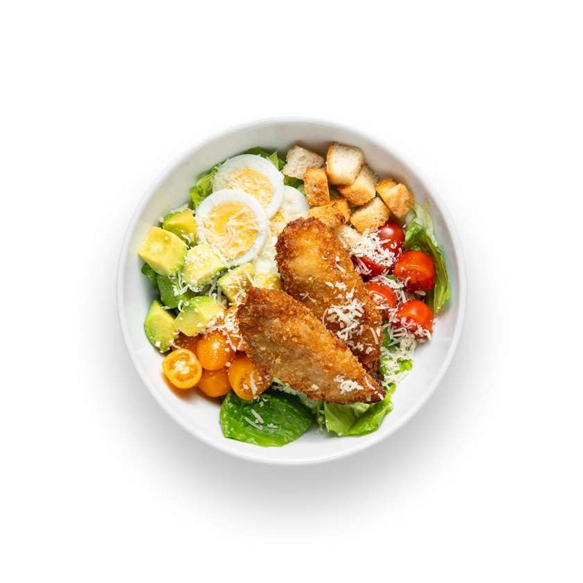 Caesar bowl with crispy chicken fingers