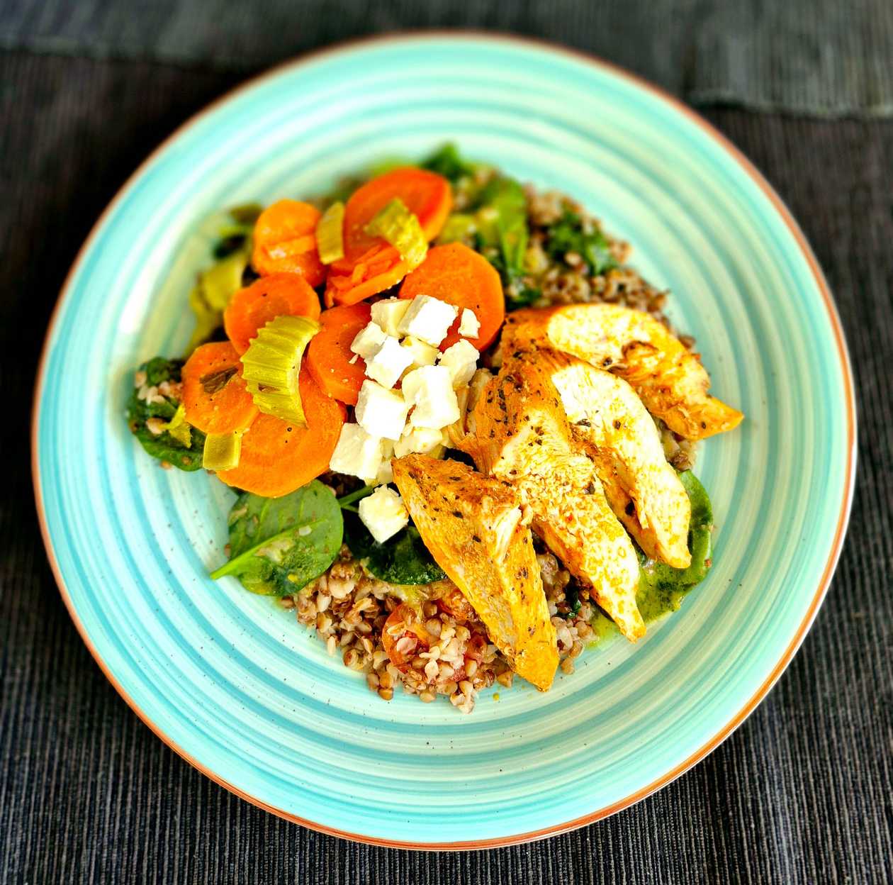 Warm Salad (buckwheat, feta, cherry tomatoes, spinach, celery, carrot, chicken, chili-mango dressing)