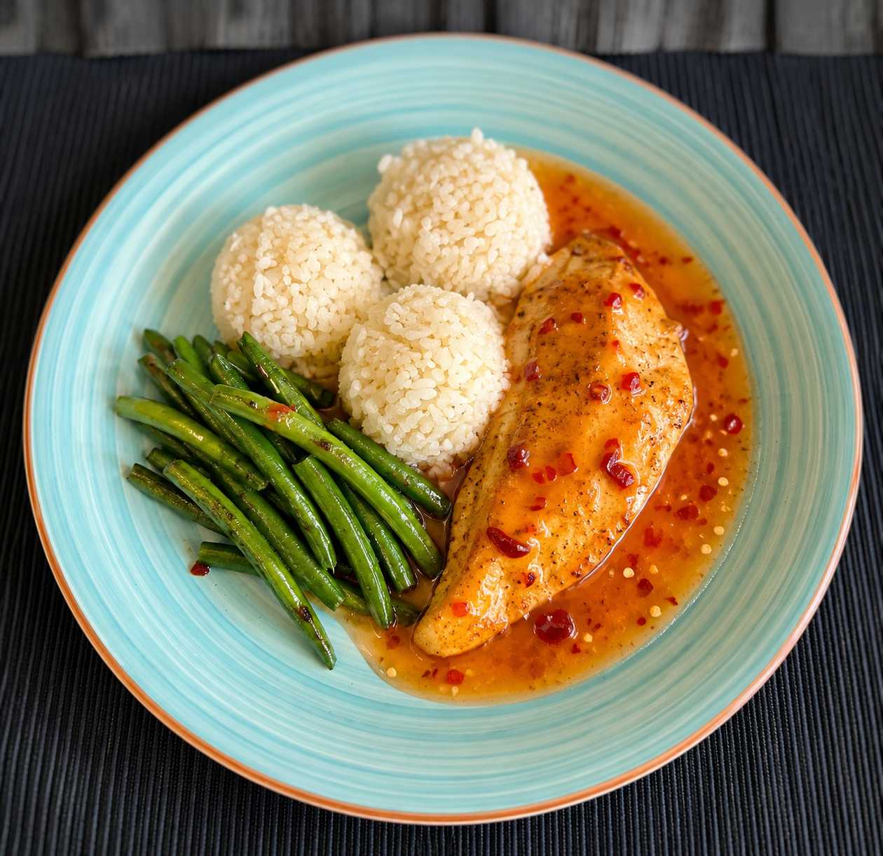 Turkey steak in chili-honey sauce with steamed rice and green beans