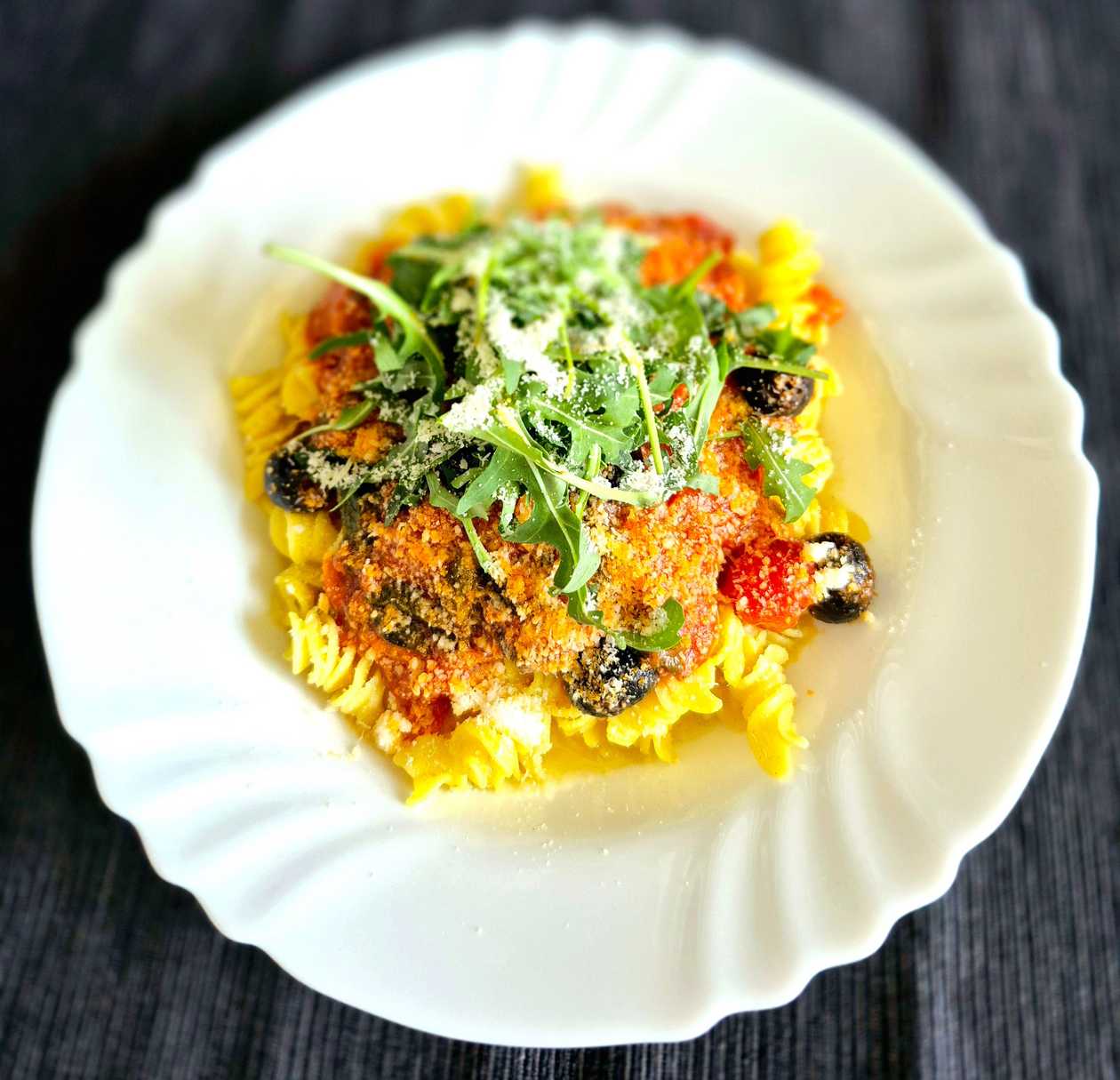 Fresh Italian Fusilli with Tuna, Olives, Pomodoro, Arugula, and Parmesan