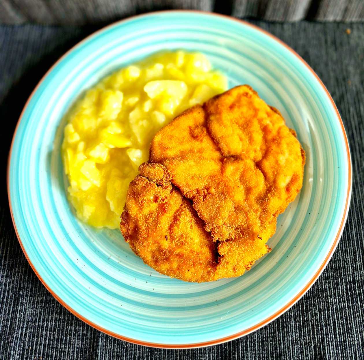 Fried pork schnitzel with Slovak potato salad