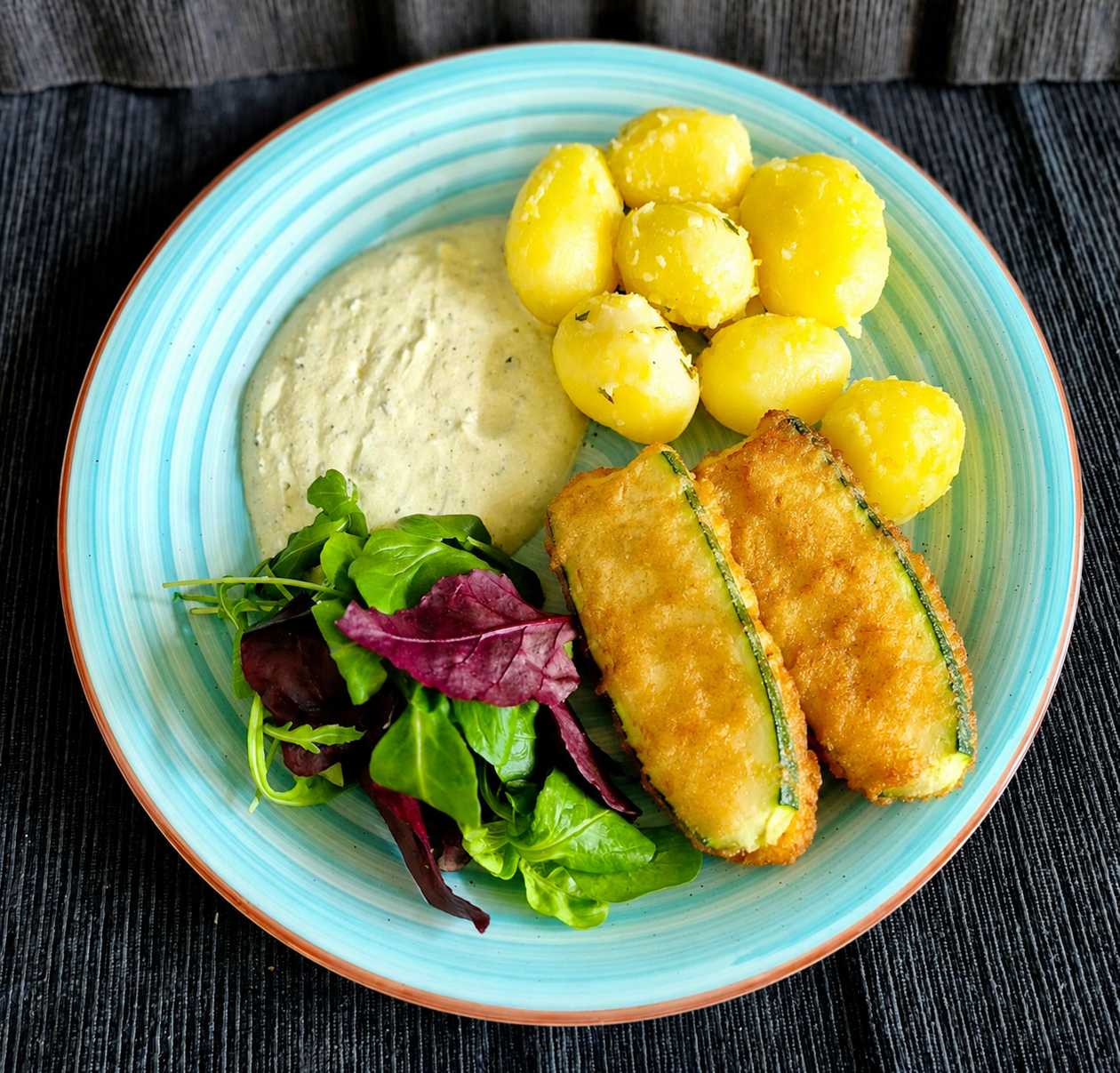 Zucchini in Beer Batter with Boiled Potatoes, Garlic Dressing, and Salad