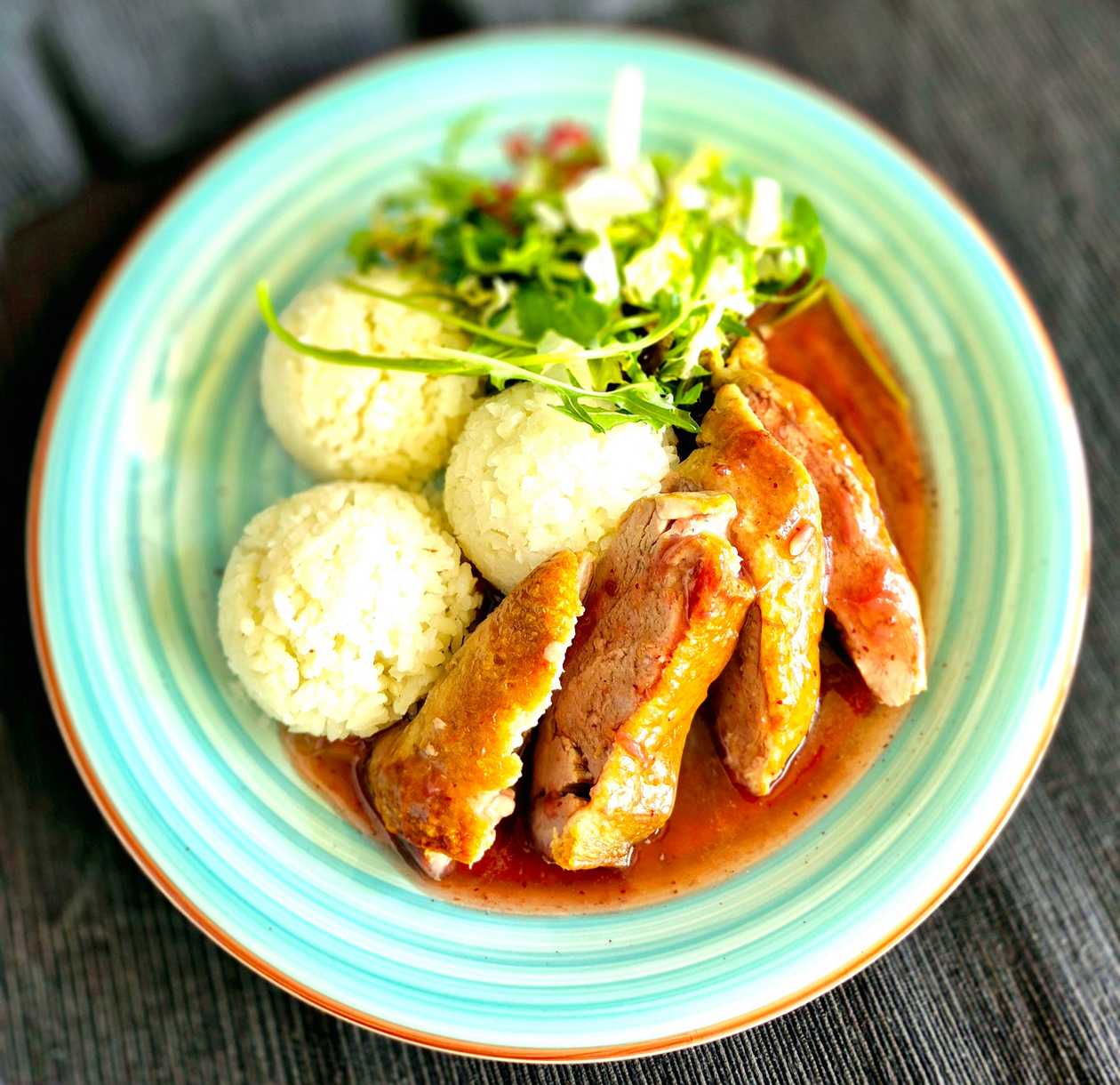 Duck Breast with Cranberry Sauce, Steamed Rice, and Mixed Salad