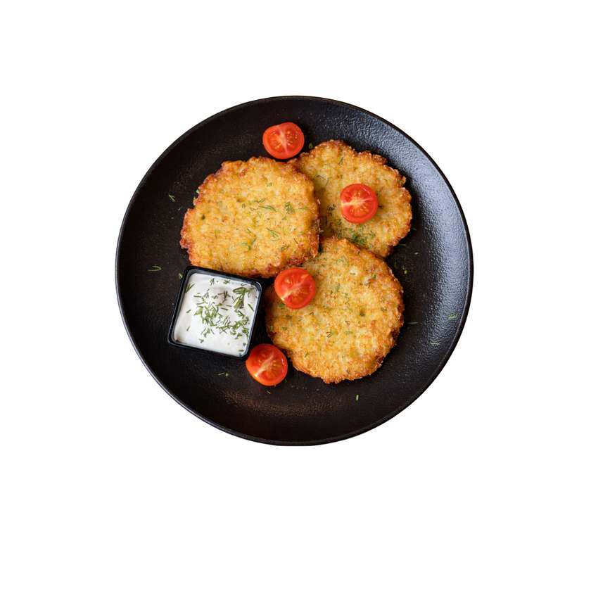 Potato pancakes with bacon and sour cream