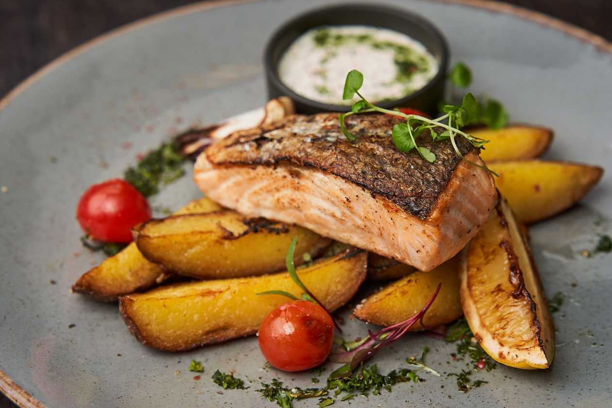 Grilled salmon with oven baked potatoes