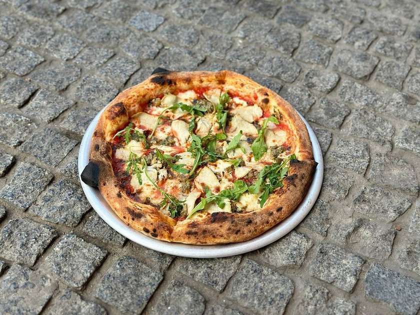 Pizza with turkey and marinated eggplant