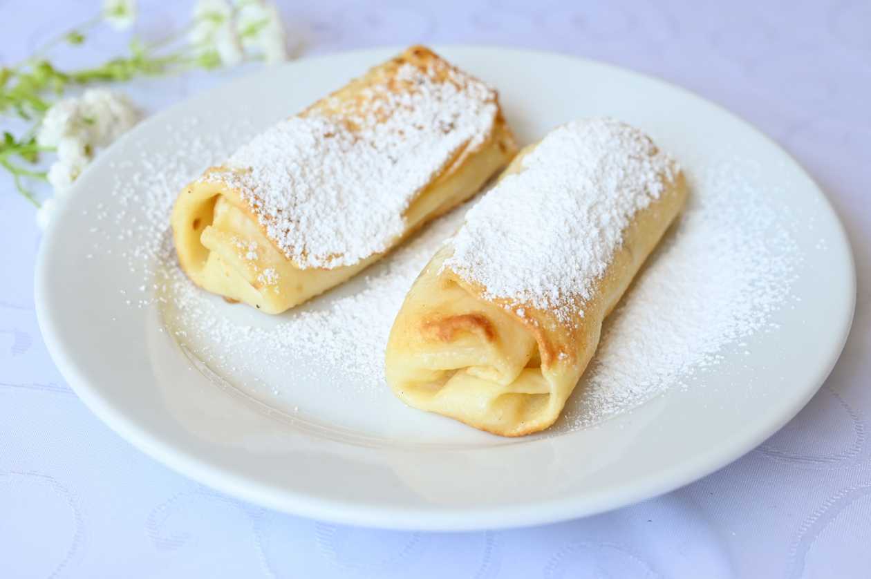 Crepes with Sweet Cheese, Sour Cream, and Sugar