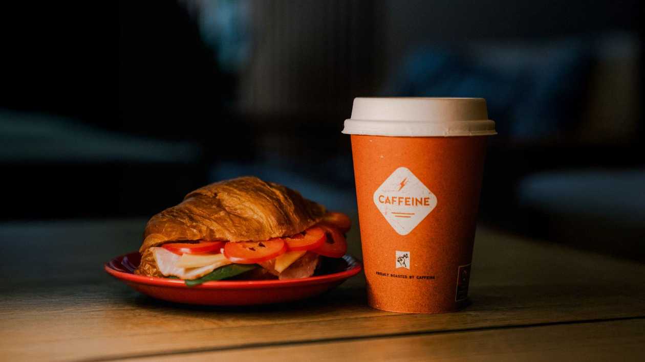 Cappuccino 470ml + Croissant with ham and cheese 145 g