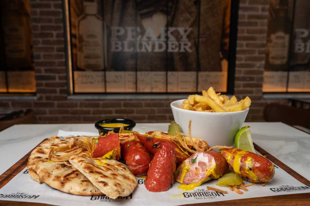 BLACK HAND SAUSAGE BOARD