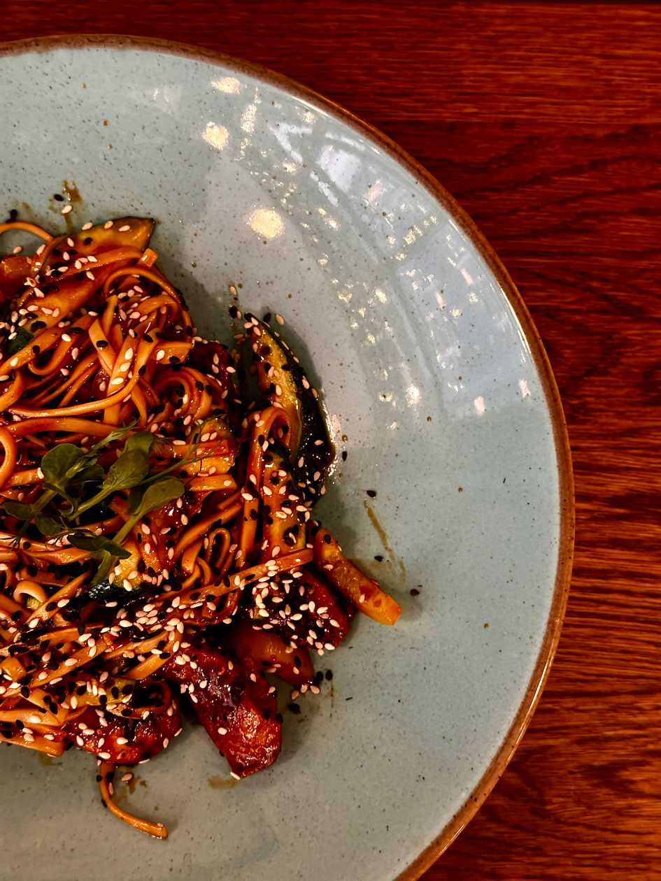 Woks with soba noodles, vegetables in Teryaki- Chilli sauce