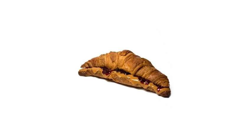 Croissant with lingonberry jam and peanut butter