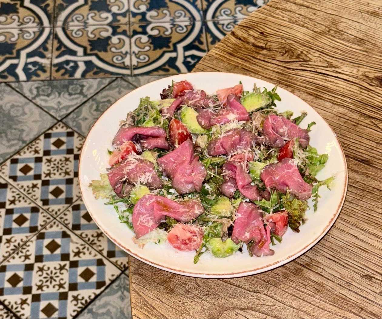 Roast Beef Salad with Tomatoes, Avocado, Mixed Greens, Nut Sauce, and Pecorino Cheese