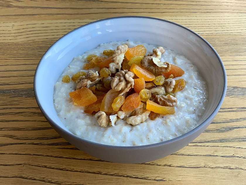 Oatmeal with dried fruits and nuts cooked on water