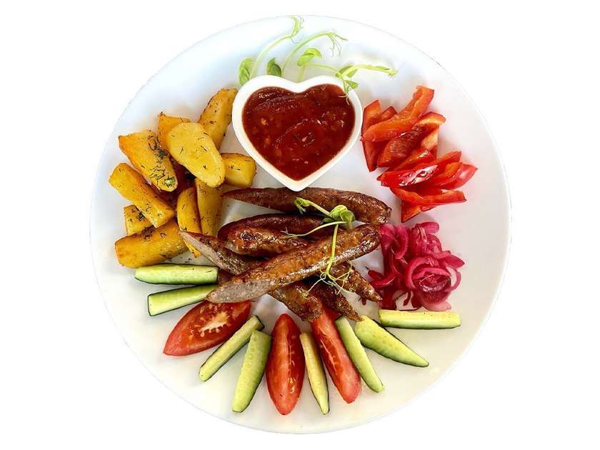 Veal sausages - grilled with vegetables and "Satsabeli" sauce