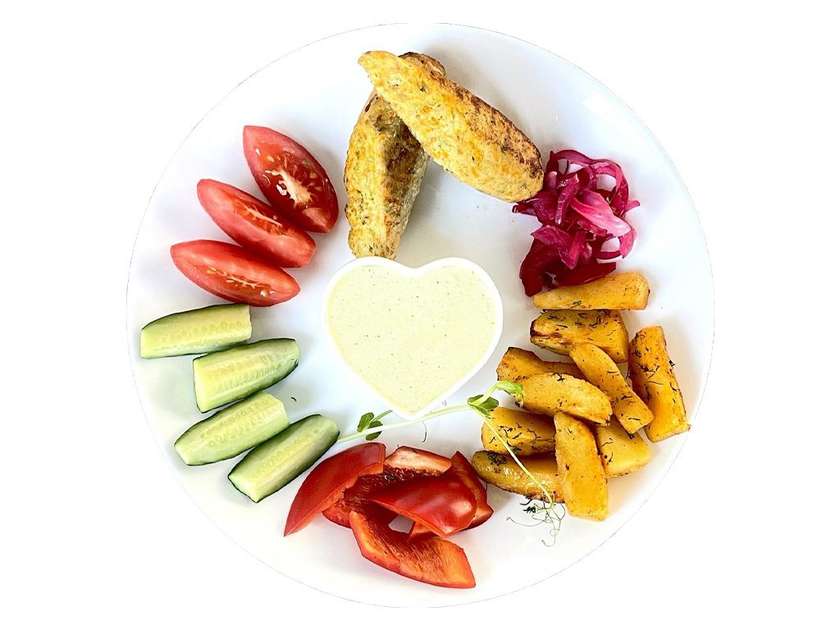 Pink salmon lula kebab with vegetables and Caesar sauce