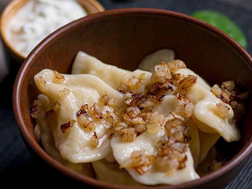 Varenyky with potatoes and porcini mushrooms