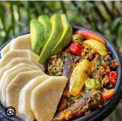 Boiled yam with egg stew and meat