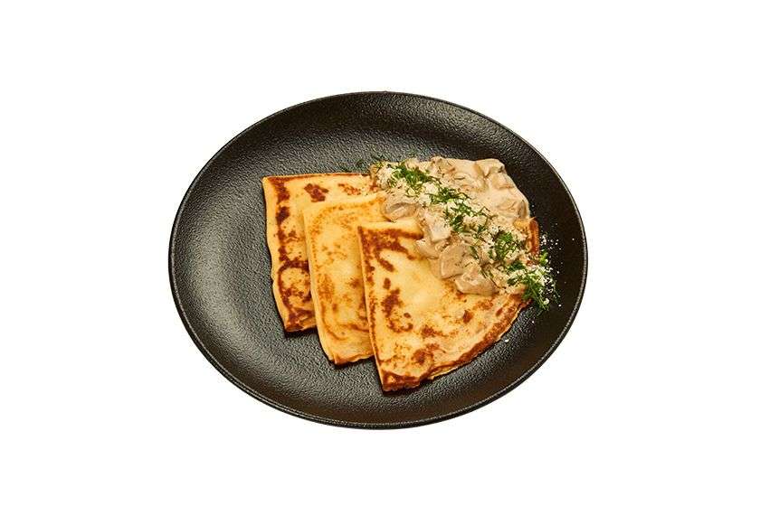 Thin pancakes with pulled pork