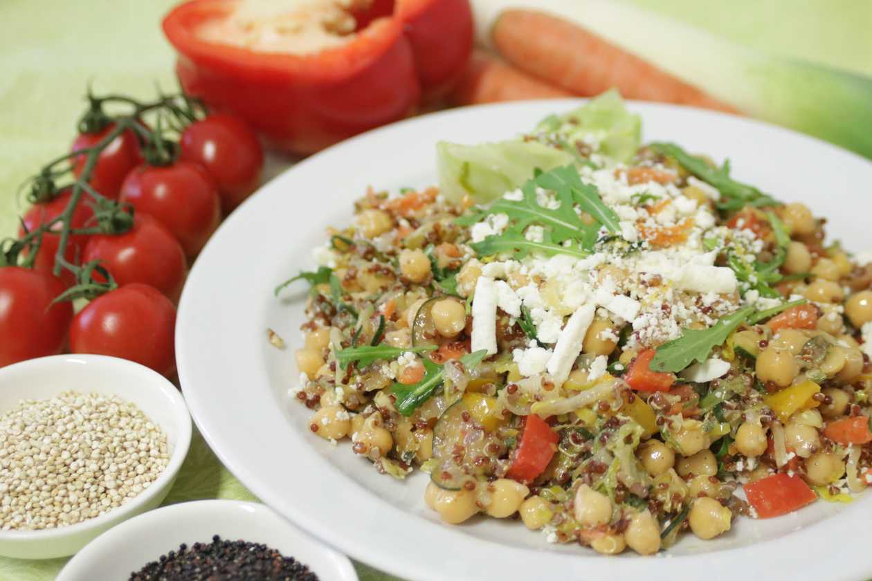 Chickpea salad with quinoa, vegetables, and feta cheese