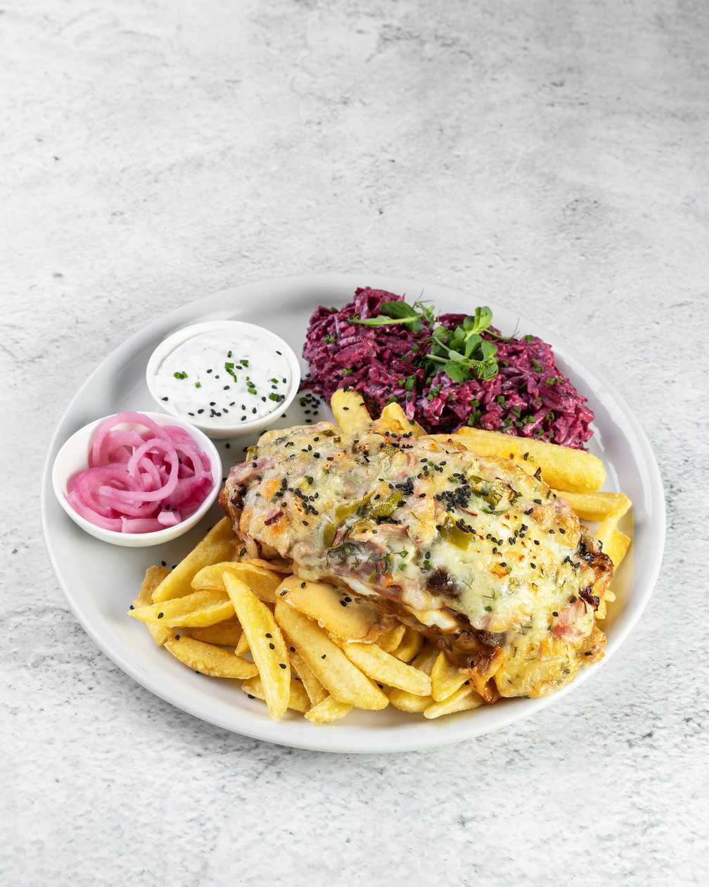 Chicken chop Hedgehog's style with boiled-fried potatoes, pickled onions, beet and fresh salad