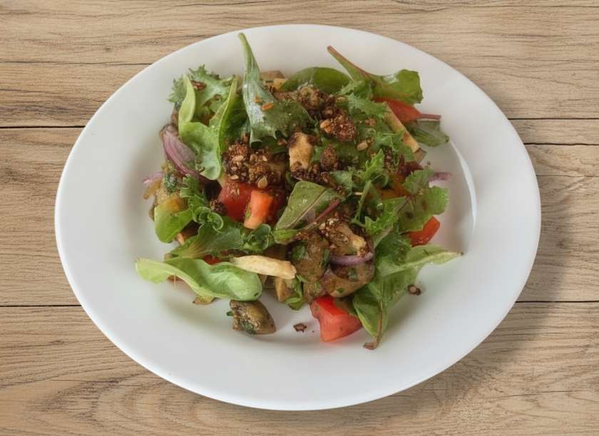 Salad with mixed tomatoes and baked eggplant