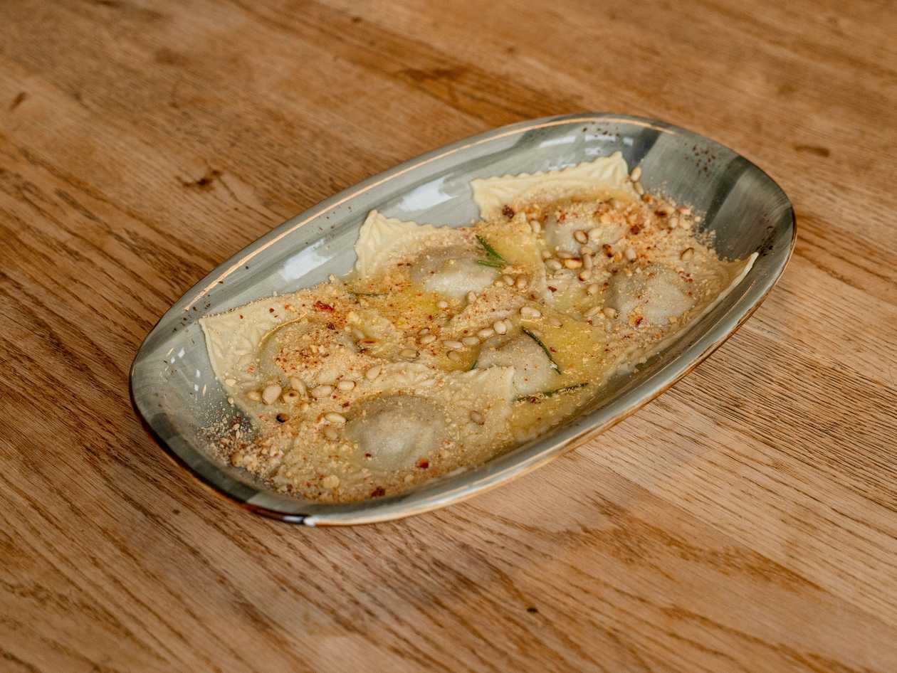 Ravioli with stewed veal leg, baked mushrooms and demiglas sauce Copy