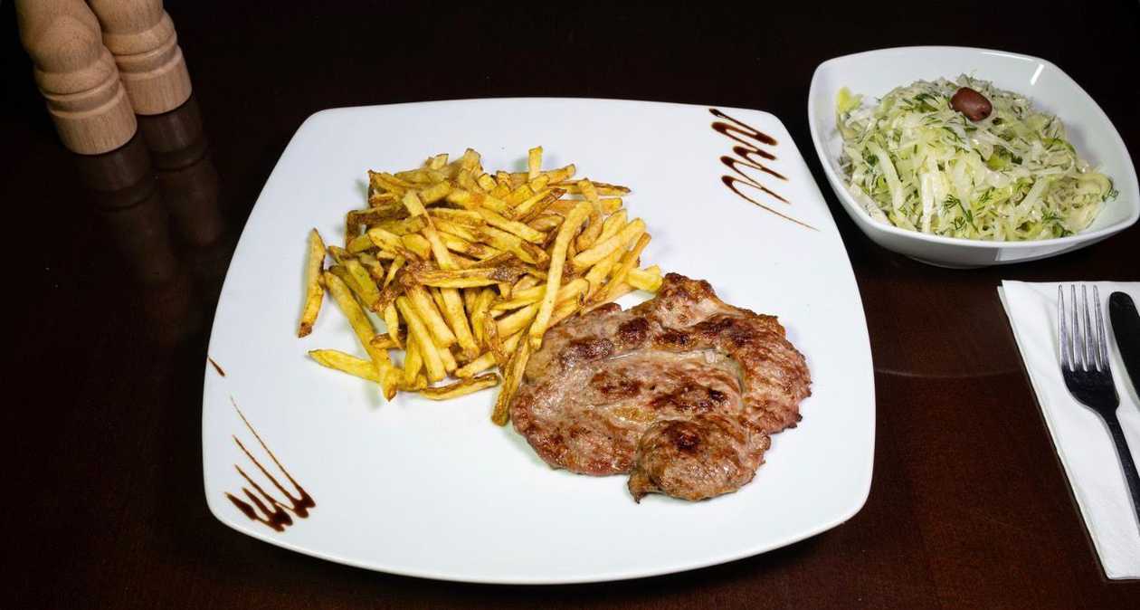 Grilled Pork Collar with French Fries and White Cabbage Salad