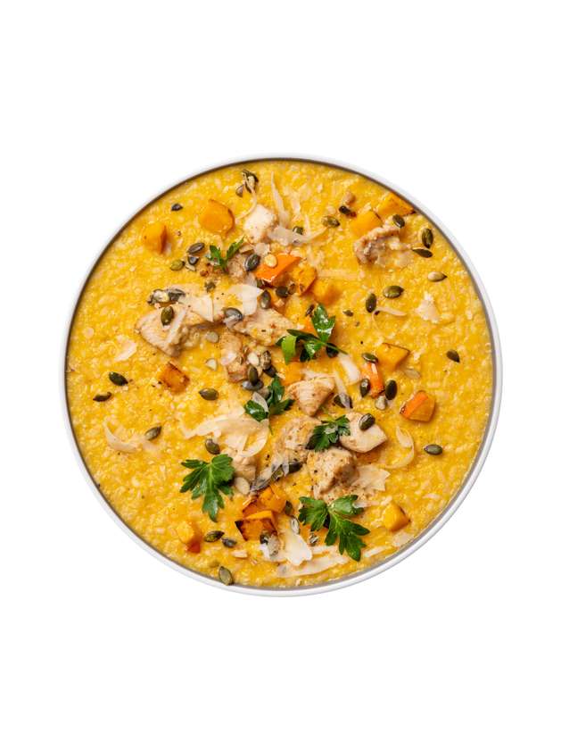 Pumpkin risotto with chicken, roasted pumpkin, pumpkin seeds, and parmesan