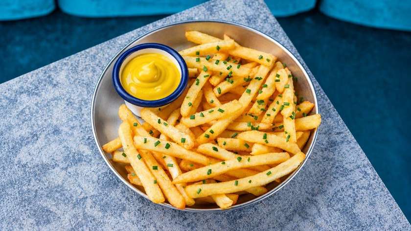 FRENCH FRIES WITH CHEDDAR SAUCE AND CHIVES
