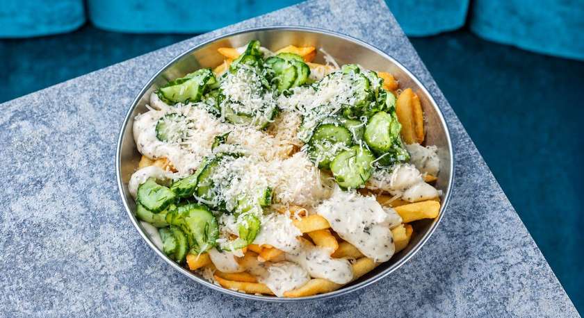 FRENCH FRIES WITH TRUFFLE SAUCE, PARMESAN AND PICKLES