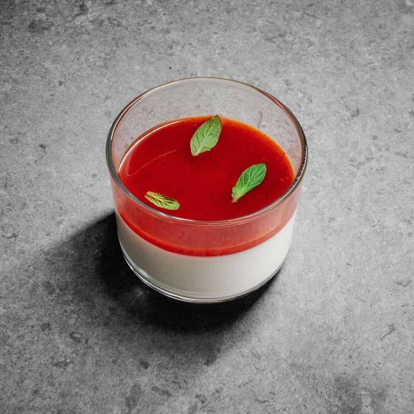 Pudding with berry sauce