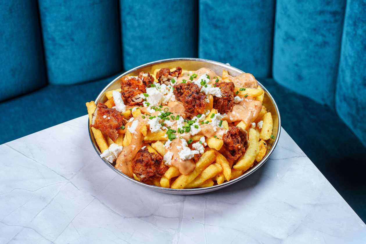 FRIES WITH CRISPY CHICKEN, HANNIBAL SAUCE AND FETA CHEESE