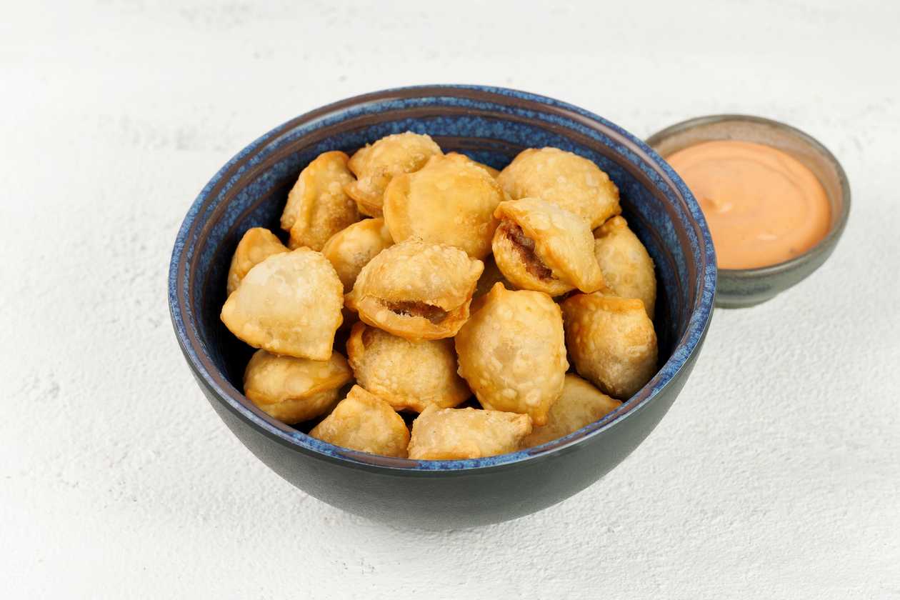 Fried dumplings with sauce